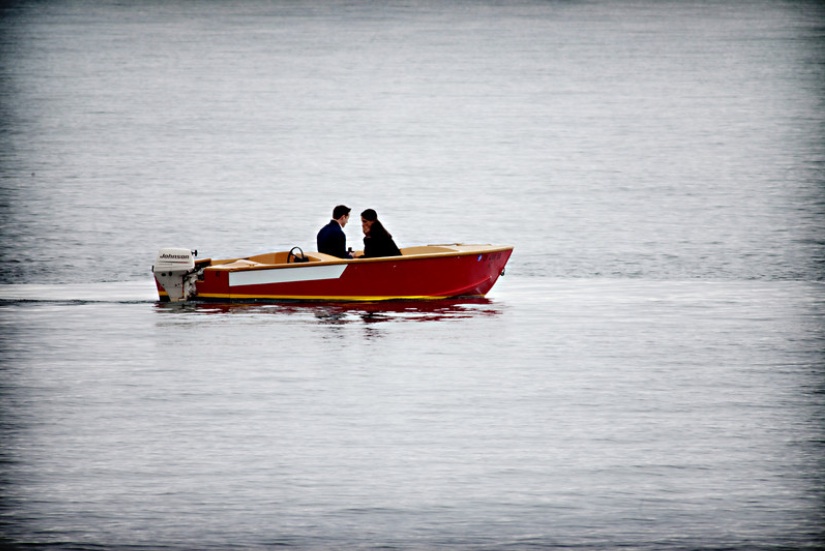 Couple riding in boat