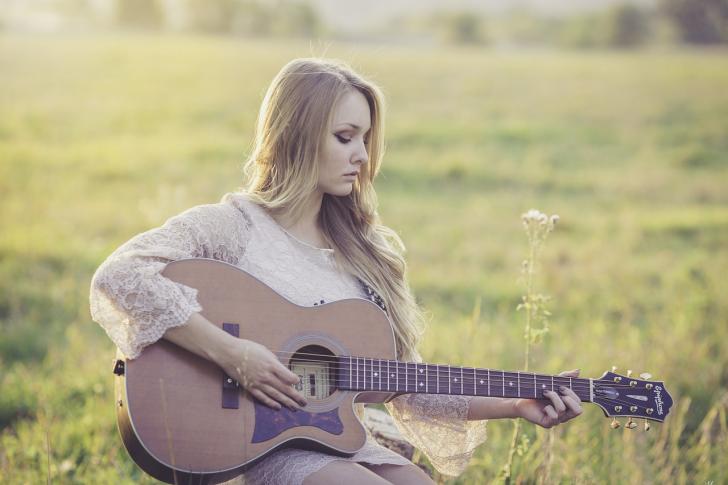 a-girl-playing-guitar