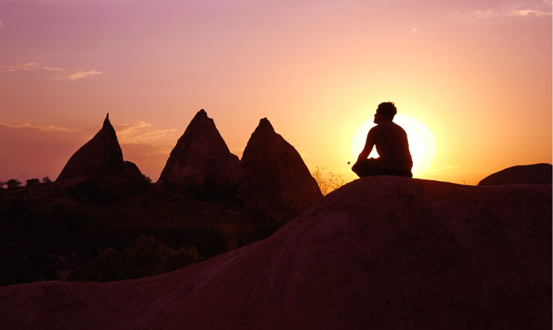 Man meditating in the morning