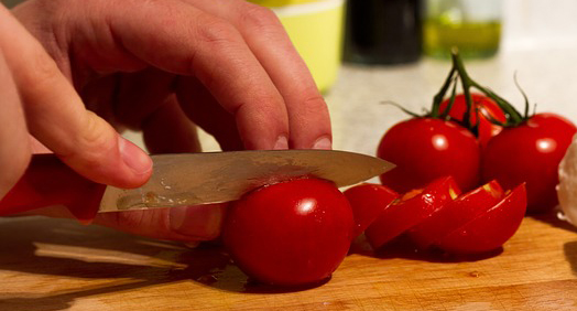 chopping tomatoes