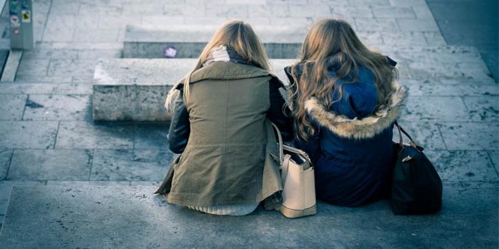 girls sitting